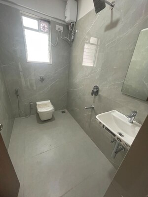 Bathroom in 3 BHK Apartment at Andheri CHS, Andheri West – for Rent