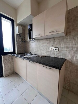 Kitchen in 4 BHK Apartment at Conscient Heritage Max, Sector 102 – for Sale