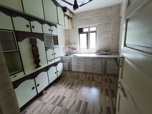 Kitchen in 1 BHK Apartment at Lodha Amara, Kolshet Road – for Sale