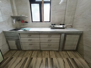 Kitchen in 1 BHK Apartment at Lodha Amara, Kolshet Road – for Sale