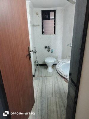 Bathroom in 2 BHK Apartment at Indra Darshan Apartment, Andheri West – for Rent
