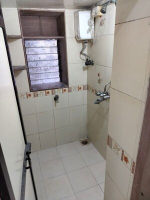Bathroom in 1 BHK Apartment at Shiv Kirti Apartment, Malad West – for Rent