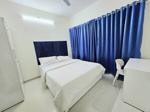 Master Bedroom in 1 BHK Apartment at Omkar Signet, Malad East – for Rent