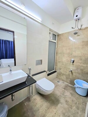 Washroom in 1 BHK Apartment at Omkar Signet, Malad East – for Rent