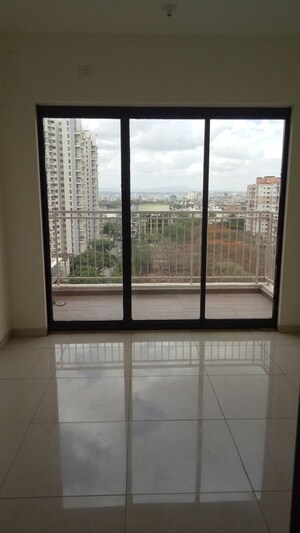 Building Lobby in 1 BHK Apartment at Mahindra Antheia, Pimpri – for Rent