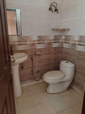 Bathroom in 2 BHK Builder Floor at A and M Shakti Plaza, Shakti Khand Iii – for Rent