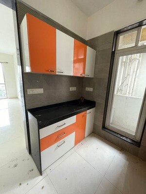 Kitchen in 3 BHK Apartment at Vasant Fiona, Pokhran Road No Two – for Rent