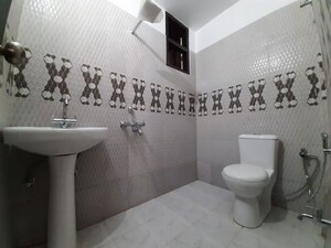Bathroom in 3 BHK Apartment at Mahmoorganj – for Sale