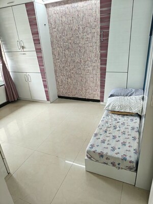 Bedroom in 2 BHK Apartment at Shruti CHS, Kandivali West – for Sale