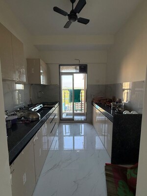 Kitchen in 1 BHK Apartment at Anant Metropolis Insignia Towers, Kasarvadavali – for Rent