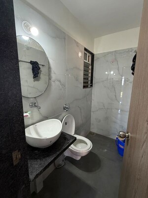 Bathroom in 1 BHK Apartment at Anant Metropolis Insignia Towers, Kasarvadavali – for Rent