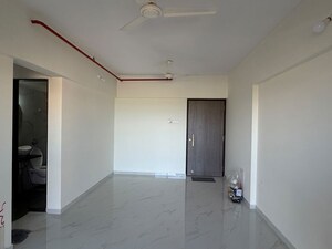 Living Room in 1 BHK Apartment at Anant Metropolis Insignia Towers, Kasarvadavali – for Rent