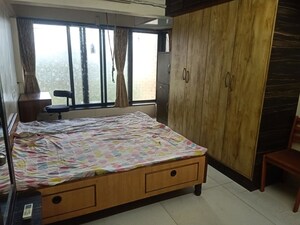 Bedroom in 2 BHK Apartment at Lokpuram CHS, Vasant Vihar – for Rent