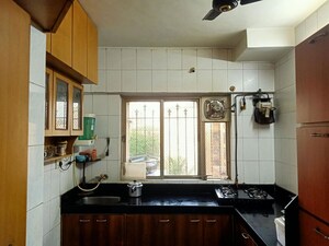 Kitchen in 2 BHK Apartment at Hyde Park Galaxy, Manpada – for Rent