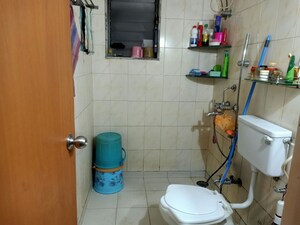 Bathroom in 2 BHK Apartment at Hyde Park Galaxy, Manpada – for Rent