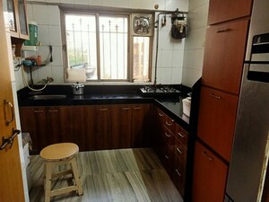 Kitchen in 2 BHK Apartment at Hyde Park Galaxy, Manpada – for Rent