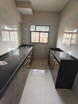 Kitchen in 1 BHK Apartment at Haware Intelligentia Vector, Kasarvadavali – for Rent