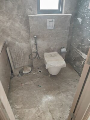 Bathroom in 3.5 BHK Builder Floor at Whiteland Blissville, Sector 76 – for Sale