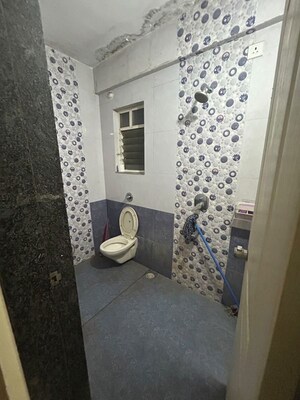 Bathroom in 2 BHK Apartment at Renuka Gulmohar C Building CHS, Pimpri – for Rent