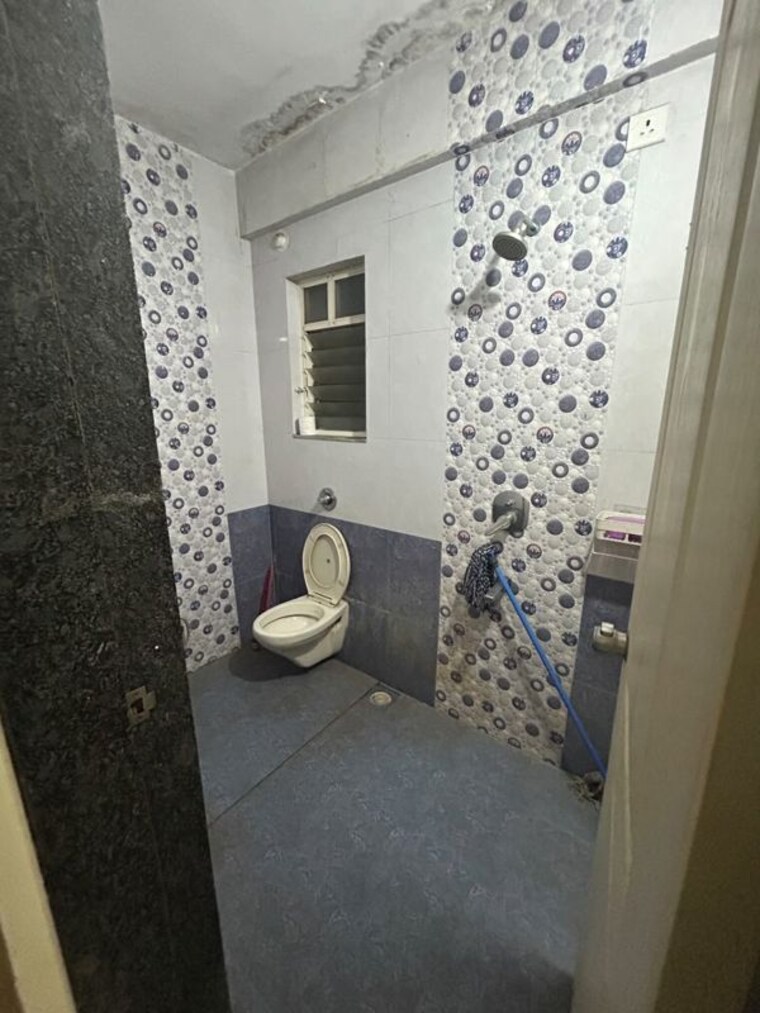 Bathroom, renuka-gulmohar-c-building-chs 2 Bedroom 618 Sq.Ft. Apartment In Pimpri Pune 10711109