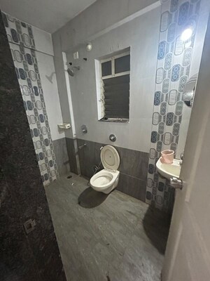 Bathroom in 2 BHK Apartment at Renuka Gulmohar C Building CHS, Pimpri – for Rent