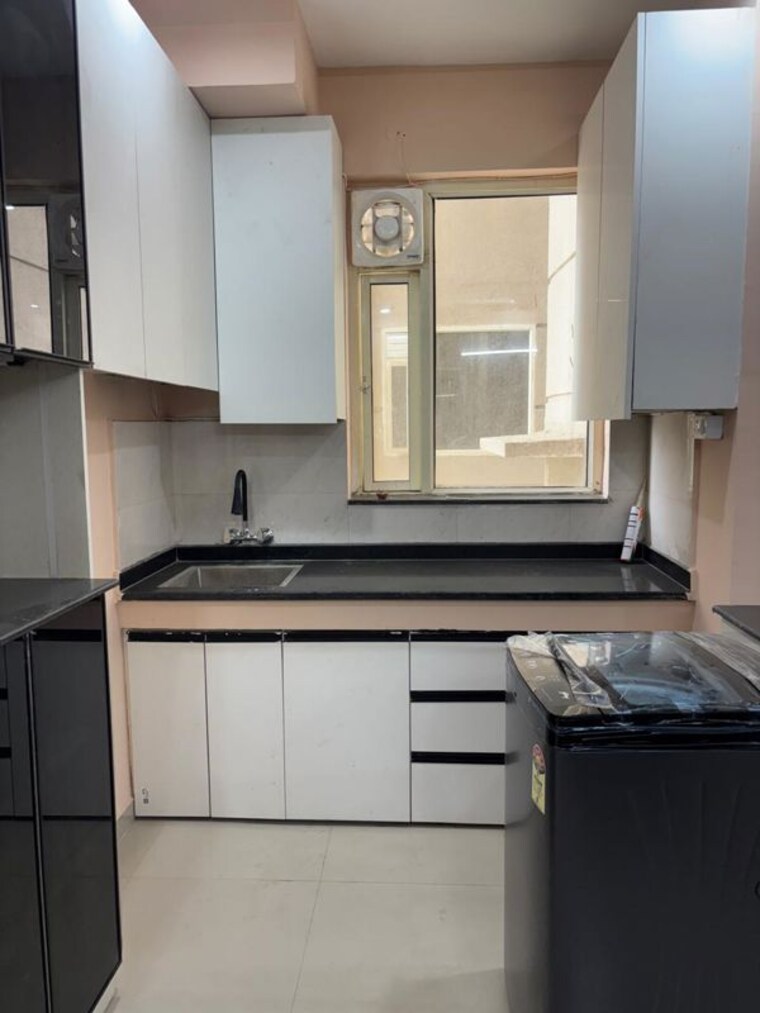 Kitchen, pyramid-midtown 2 Bedroom 678 Sq.Ft. Apartment In Sector 59 Gurgaon 10711128