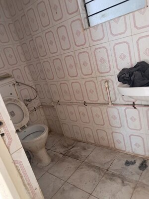 Bathroom in 2 BHK Apartment at Sai Niketan Shahungar, Shahunagar – for Rent