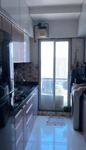 Kitchen in 2 BHK Apartment at Mangal Karini, Goregaon West – for Sale