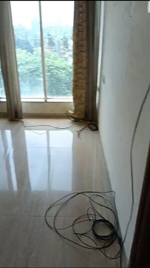 Building Lobby in 3 BHK Apartment at Thakur Kedarnath Tower, Versova – for Rent
