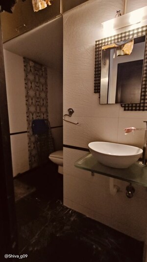 Bathroom in 2 BHK Apartment at Shiv Sagar Nilkanth CHS, Dadar West – for Rent
