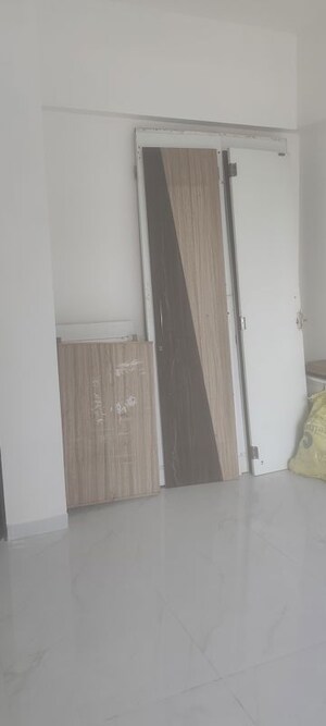 Building Lobby in 1 BHK Apartment at Anant Metropolis Insignia Towers, Kasarvadavali – for Rent