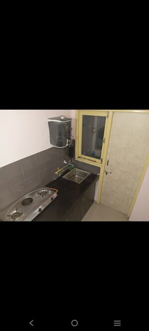 Team Area in 1 BHK Apartment at Applewood Satyesh Residency, Shela – for Rent
