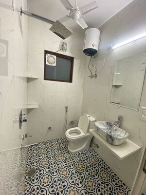 Bathroom in 3 BHK Builder Floor at Defence Colony – for Rent