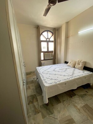 Bedroom in 3 BHK Builder Floor at Defence Colony – for Rent