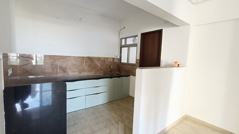 Kitchen, kolte-patil-life-republic-aros 3 Bedroom 1058 Sq.Ft. Apartment In Hinjewadi Pune 10711531