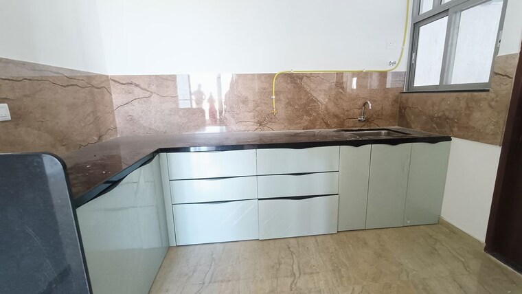 Kitchen, kolte-patil-life-republic-aros 3 Bedroom 1058 Sq.Ft. Apartment In Hinjewadi Pune 10711531