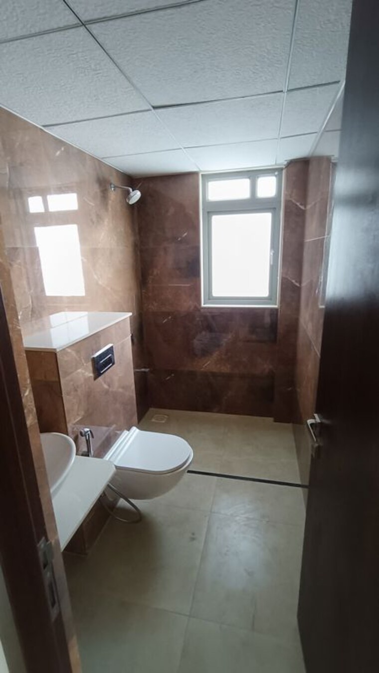 Bathroom, kolte-patil-life-republic-aros 3 Bedroom 1058 Sq.Ft. Apartment In Hinjewadi Pune 10711531