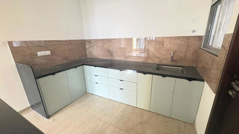 Kitchen, kolte-patil-life-republic-aros 3 Bedroom 1058 Sq.Ft. Apartment In Hinjewadi Pune 10711531