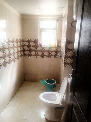 Bathroom in 2 BHK Apartment at Aims Golf Green, Tech Zone 4 Greater Noida – for Rent