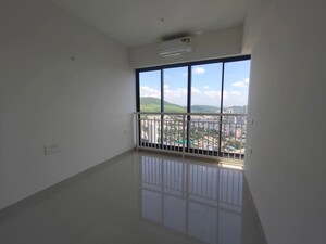 Room in 2 BHK Apartment at Dynamix Divum, Malad East – for Rent