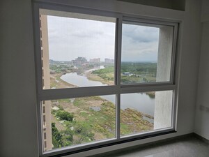 Room in 2 BHK Apartment at Zen Elite, Kharadi – for Rent
