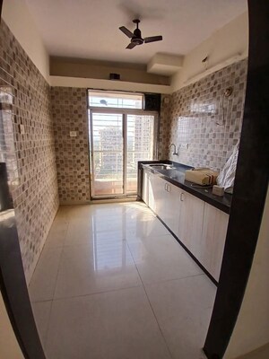 Kitchen in 2 BHK Apartment at Chamunda Heights, Ghansoli – for Rent