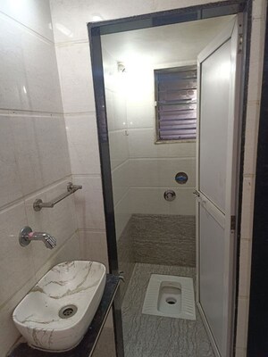 Bathroom in 2 BHK Apartment at Chamunda Heights, Ghansoli – for Rent