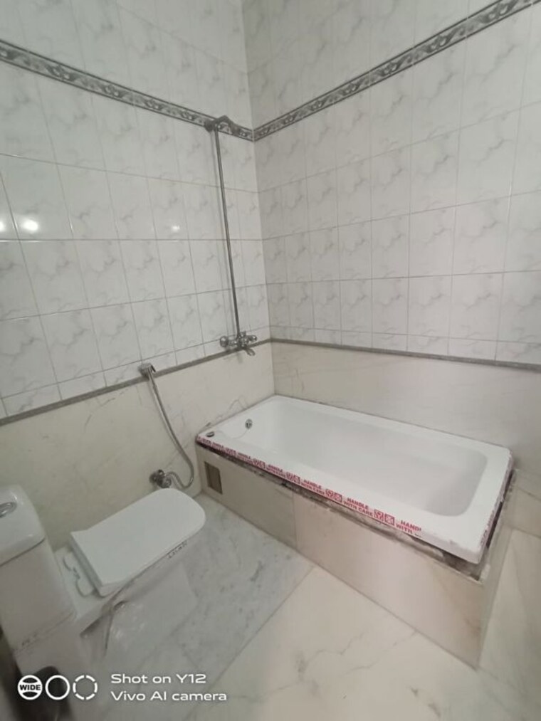Bathroom, greater kailash ii 4 Bedroom 400 Sq.Yd. Builder Floor In Greater Kailash ii Delhi 10711831