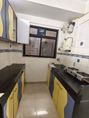 Kitchen in 1 BHK Apartment at Divya Smruthi, Malad West – for Rent