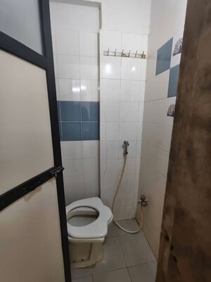 Bathroom in 1 BHK Apartment at Divya Smruthi, Malad West – for Rent