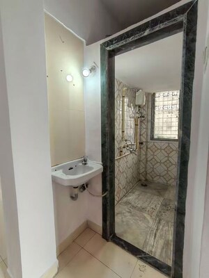 Bathroom in 1 BHK Apartment at Evershine Nagar – for Rent
