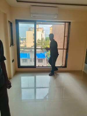 Room in 2 BHK Apartment at Sheth 72 West, Andheri West – for Rent