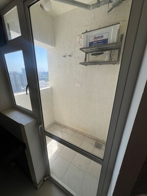 Bathroom in 2 BHK Apartment at Godrej Carnival, Mamurdi – for Rent