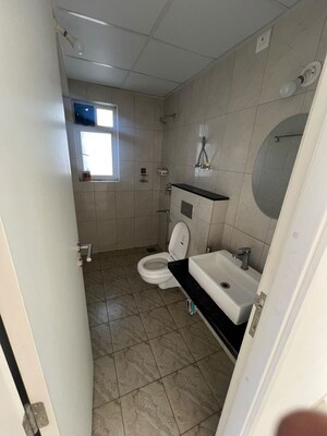Bathroom in 2 BHK Apartment at Godrej Carnival, Mamurdi – for Rent